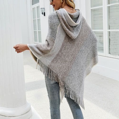 Naisten poncho hupulla