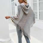 Naisten poncho hupulla