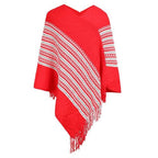 Etninen poncho tupsuilla