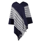 Etninen poncho tupsuilla