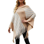 Etninen poncho tupsuilla