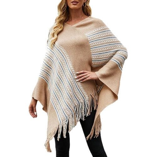 Etninen poncho tupsuilla