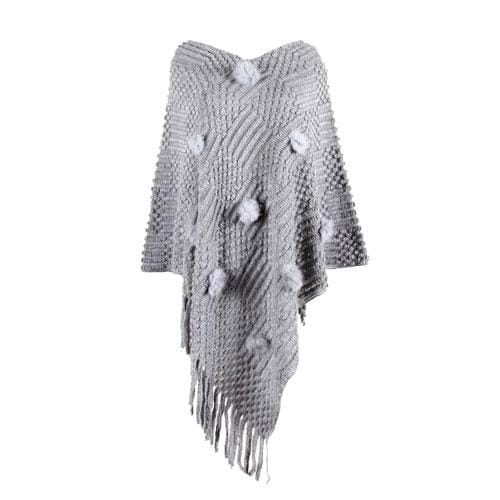 Hieno naisten poncho tupsuilla