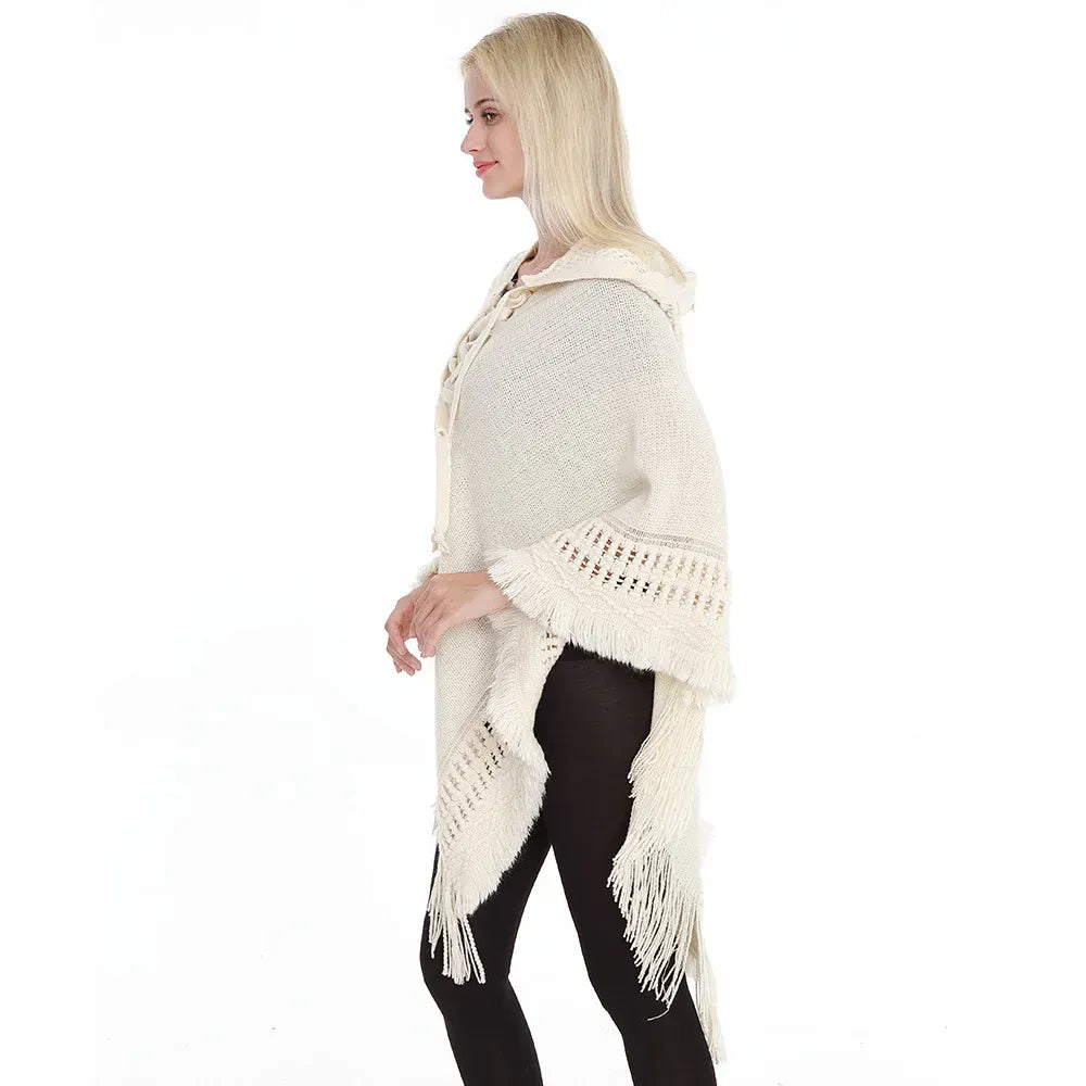 Virkattu poncho, jossa huppu ja hapsut