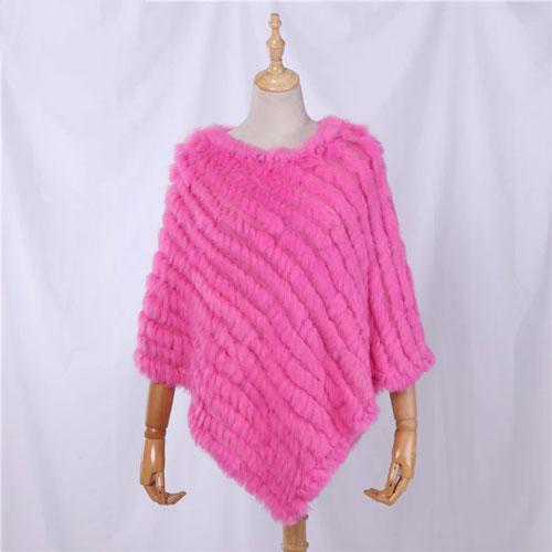 Raidallinen turkisnaisten poncho