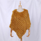 Raidallinen turkisnaisten poncho