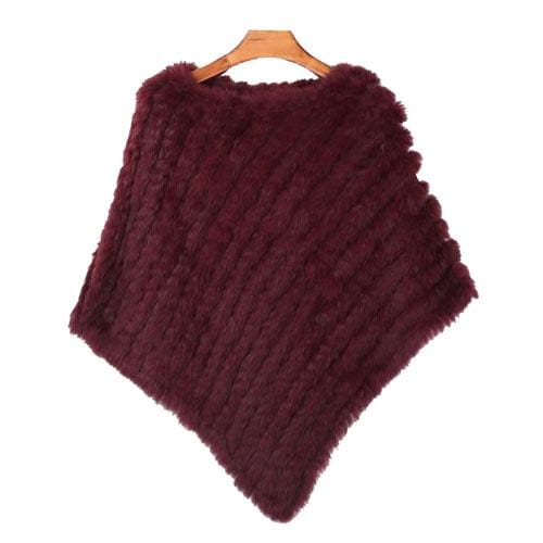 Raidallinen turkisnaisten poncho