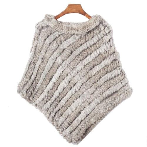 Raidallinen turkisnaisten poncho