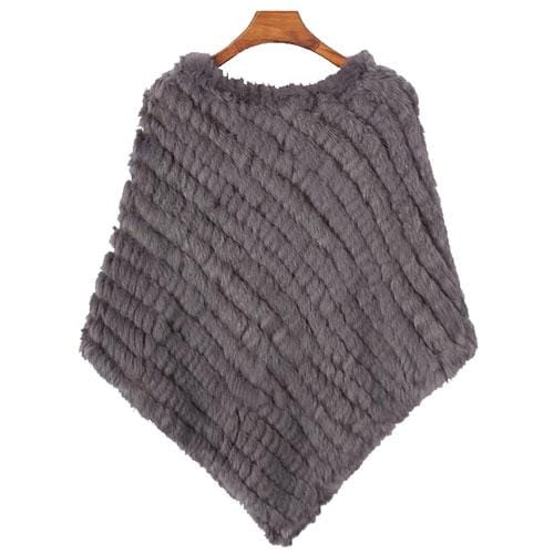 Raidallinen turkisnaisten poncho