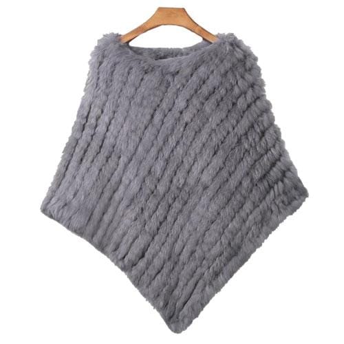 Raidallinen turkisnaisten poncho