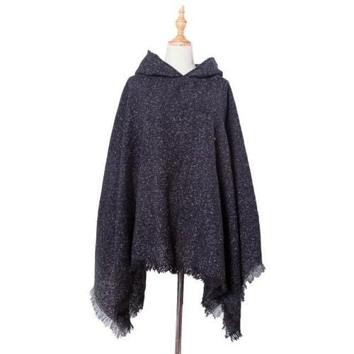 Pitkä kirjava naisten poncho