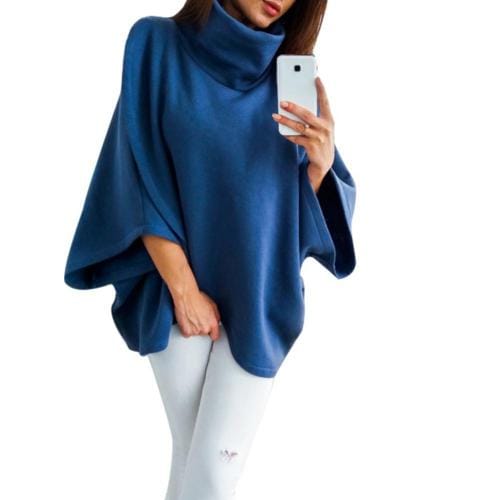 Ruudullinen naisten poncho pystypääntiellä