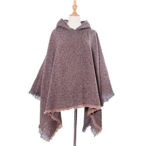 Pitkä kirjava naisten poncho