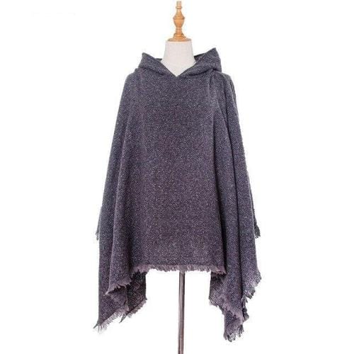 Pitkä kirjava naisten poncho