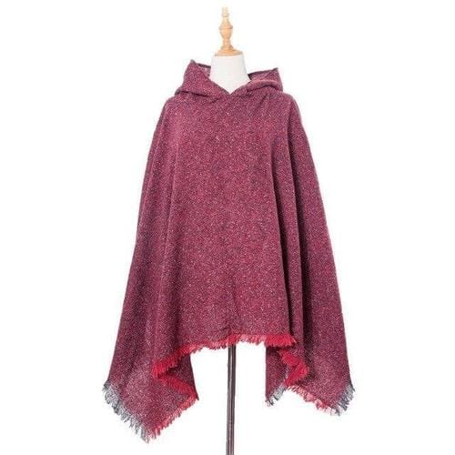 Pitkä kirjava naisten poncho