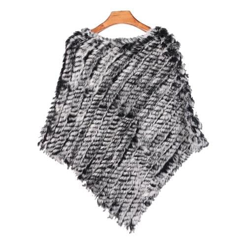 Raidallinen turkisnaisten poncho