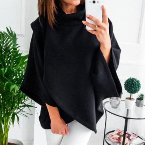 Ruudullinen naisten poncho pystypääntiellä