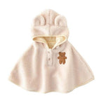 Vauvan poncho karhuteemalla