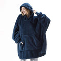 Lämmin ruudullinen poncho