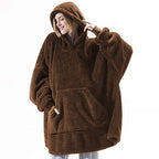 Lämmin ruudullinen poncho