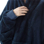 Lämmin ruudullinen poncho