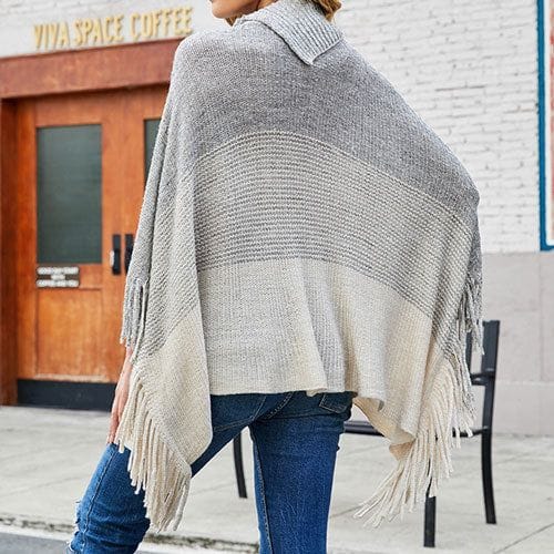 Lämmin poncho napeilla