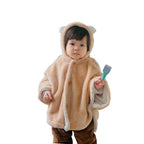Talvivauvan poncho hupulla